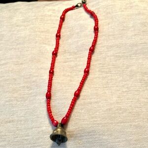 Vintage Red Glass Beaded Necklace With Brass Bell Pendant
